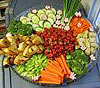 A colorful salad arranged on a plate.